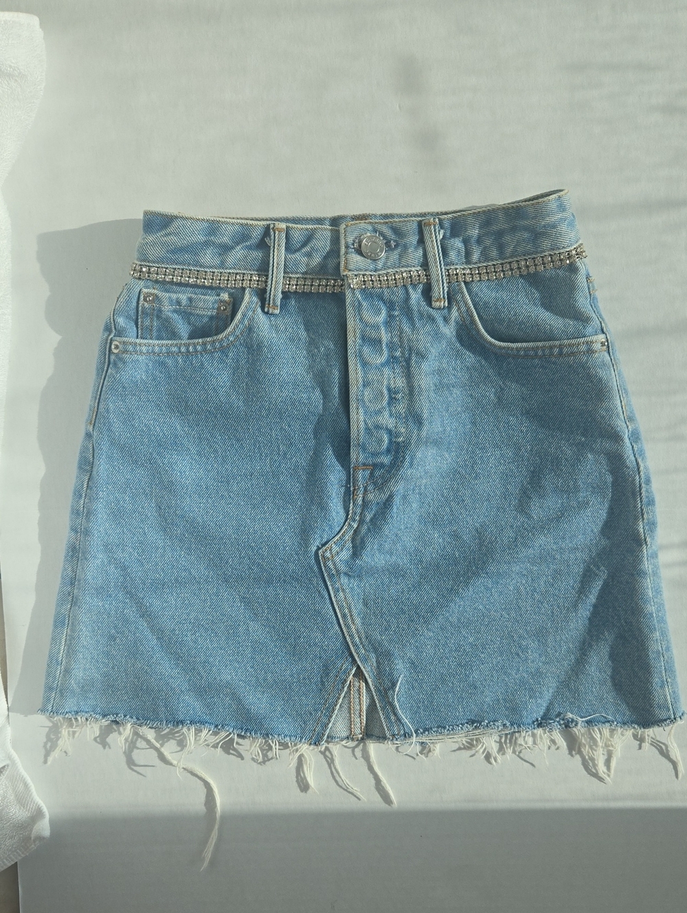 GRLFRND Washed Blue Denim Mini Skirt with Rhinestone Waist Chain
